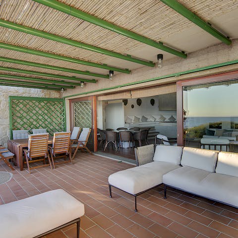 Spend days lounging on the shaded terrace, a haven from the Sardinian sun