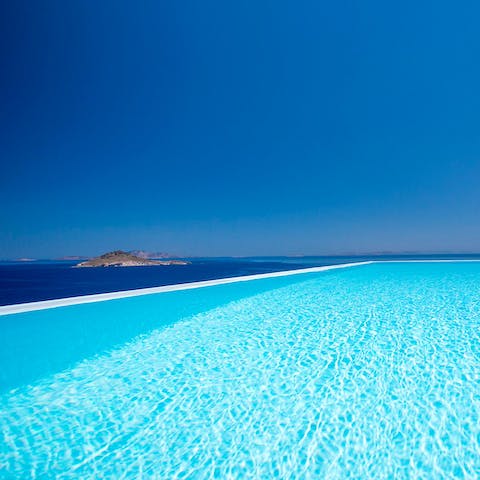 Swim in the infinity pool surrounded by jaw-dropping ocean views