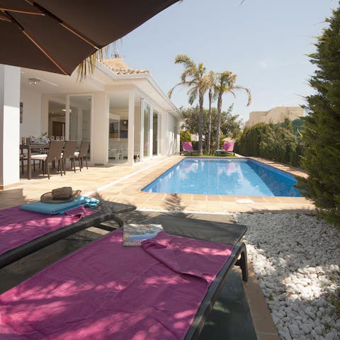 Laze on shady sun loungers and take occasional dips in your private pool