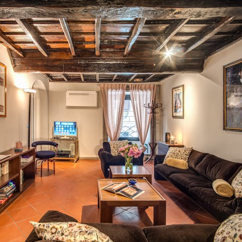 Get into the historic spirit of Rome beneath carved wood ceilings