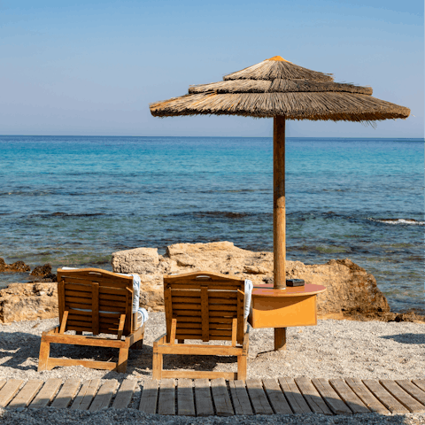 Sit back and relax on the sands of Plakia Beach, a five-minute walk away