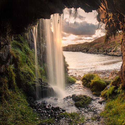 Amble through the grounds of your estate and discover hidden waterfalls