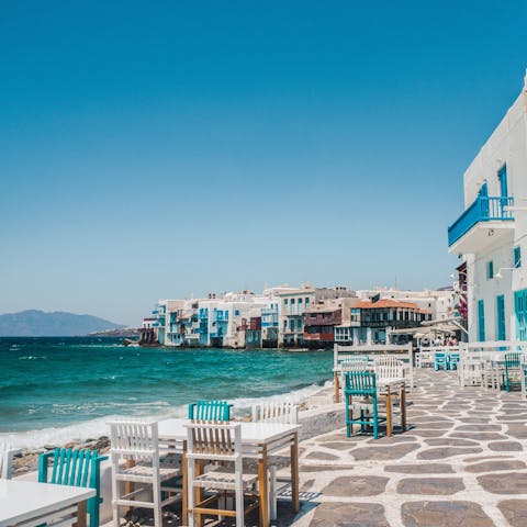 Dine out at the traditional tavernas in Mykonos Town (eighteen-minute drive)