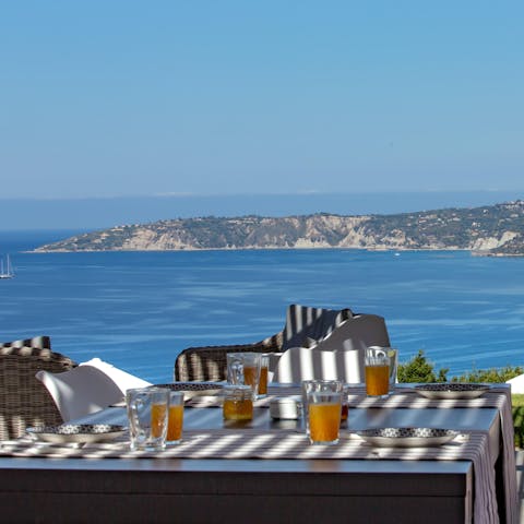 Enjoy breakfast on the terrace overlooking the sea