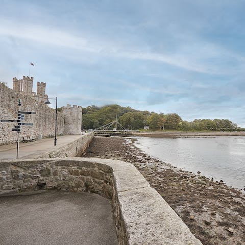 Visit Caernarfon Castle – the 13th-century castle is a UNESCO World Heritage site