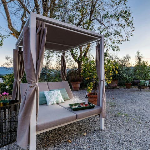 Enjoy the Tuscan sunset from the daybed