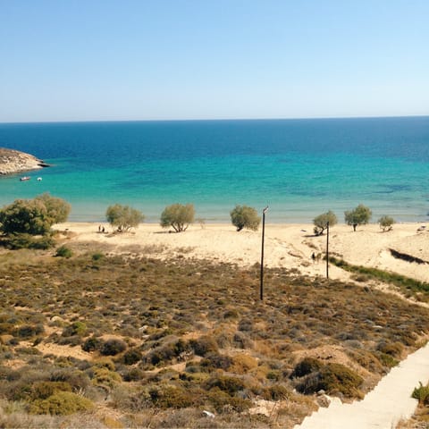 Spend the day topping up the perfect holiday tan at Ambelas Beach, which can be reached in a six-minute walk