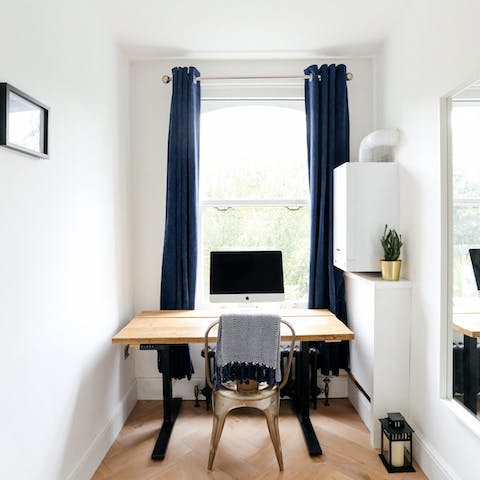 Work from home with ease in the dedicated office space with adjustable desk