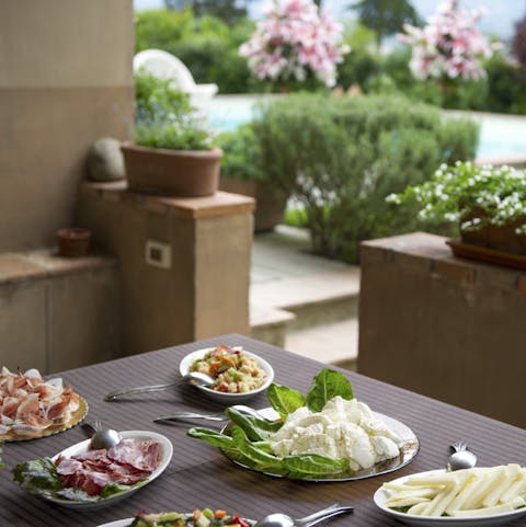 Enjoy alfresco meals under the gentle shade of the veranda terrace