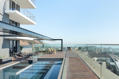Swim in the communal pool and enjoy views across Cape Town