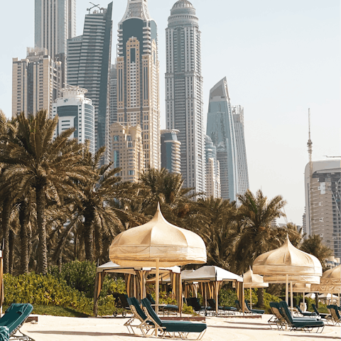 Spend leisurely days relaxing on the building's private beach