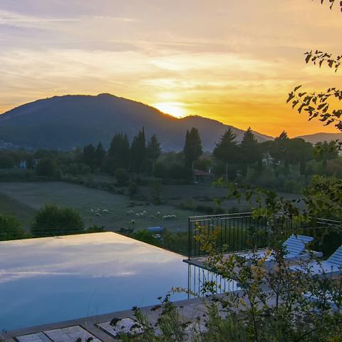 Watch the sun dip behind the mountains while you tuck into barbecue dinners, washed down with a nice, cold bottle of Efes