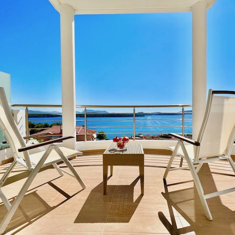 Admire the ocean views with a coffee from the balcony 