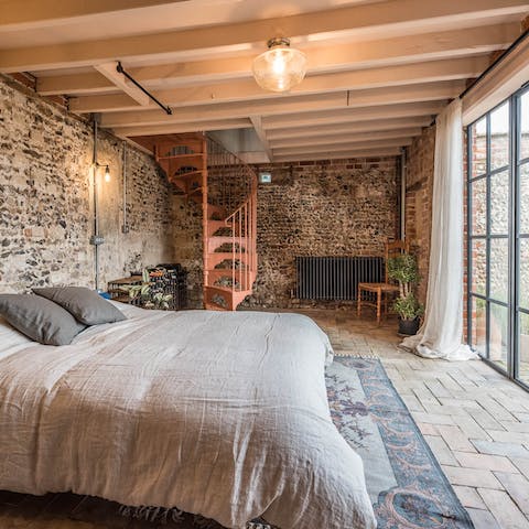 Wake up to rural views from the ground floor bedroom with crittall-style doors