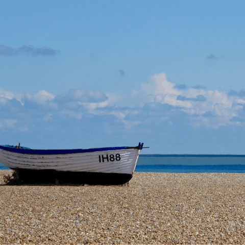 Spend an afternoon at Aldeburgh Beach, a seventeen-minute drive away