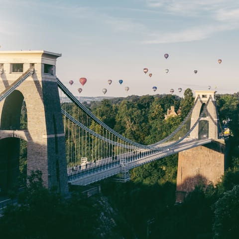 Walk sixteen minutes to visit the Clifton Suspension Bridge spanning the Avon gorge and river