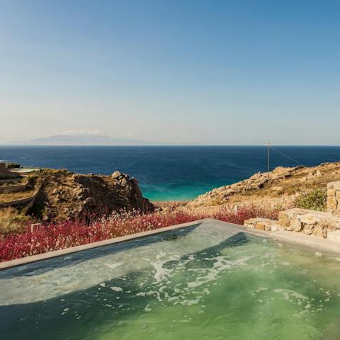 Admire your ocean views of Elia Beach from your bubbling hot tub