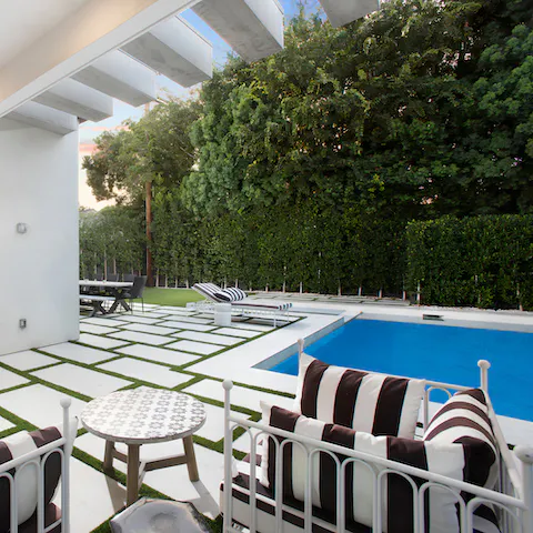 Relax on the pool terrace, perfect for your downtime hangouts