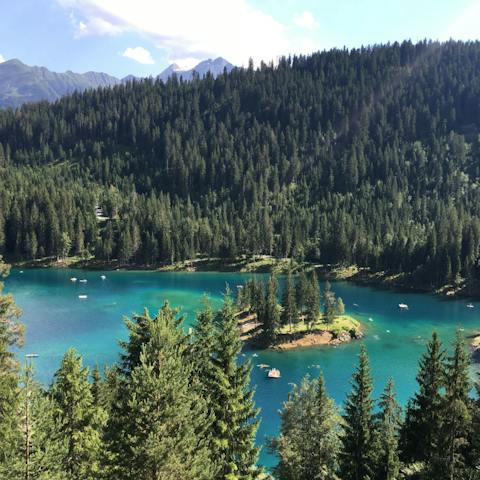 Drive five minutes (or hike forty) to the striking surroundings of Caumasee Lake