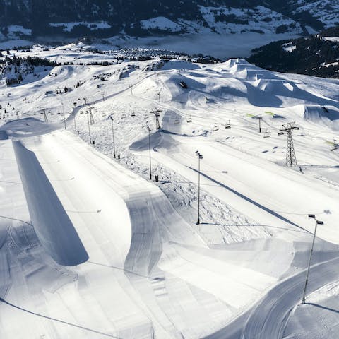 Stroll one minute to the ski lifts of LAAX for a day of shredding the slopes