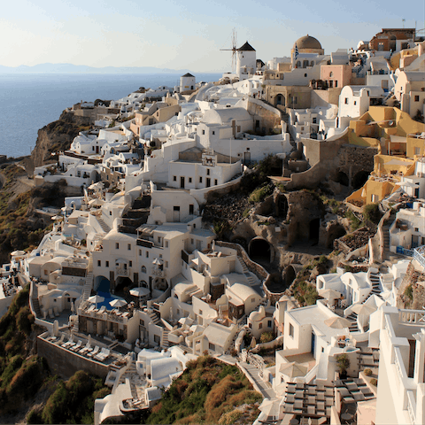 Stay in one of Santorini's hillside towns overlooking the caldera