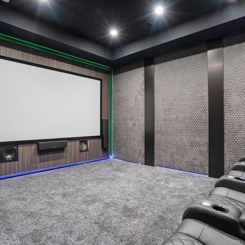 Watch your favourite Hollywood films in the plush home cinema room 