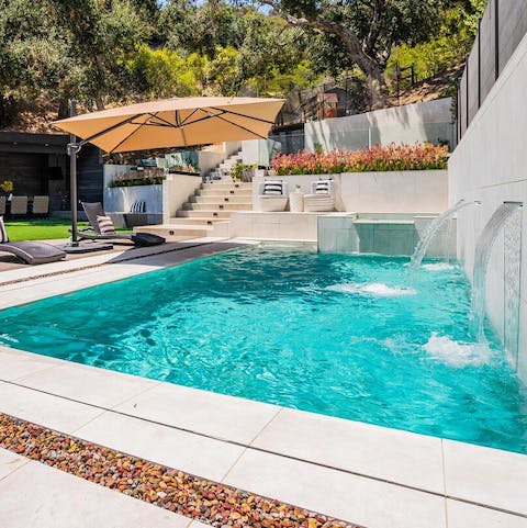 Take a refreshing dip in the private swimming pool 