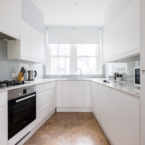 Cook up a hearty full English breakfast in the sleek kitchen ahead of a busy day of sightseeing