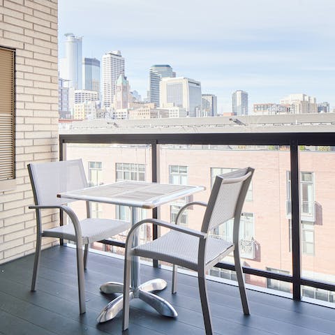 Enjoy a cool drink on the private balcony at the end of a long day