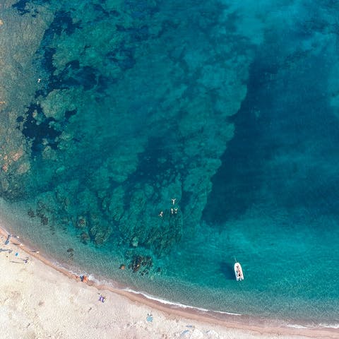 Enjoy a short eight-minute walk via a private path to the beach and soak up the Corsican sun