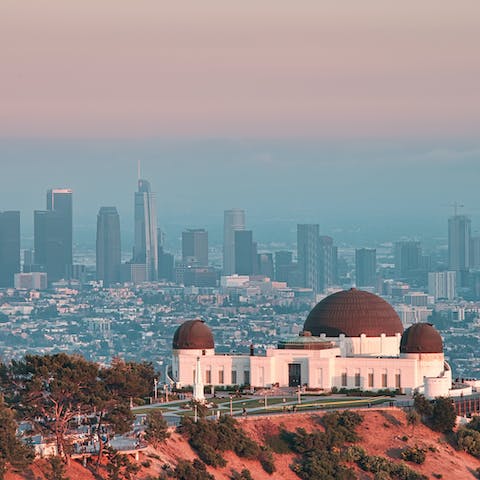 Witness panoramic scenes of LA from Griffith Observatory (sixteen-minute drive)