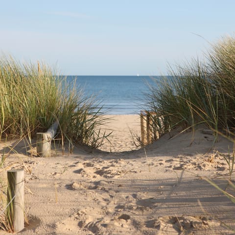 Make the short walk to Thorpeness Beach