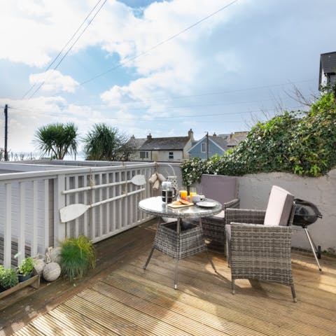 Feel the ocean breeze on the terrace, which has views of Mount's Bay in the distance