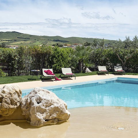 Find total relaxation whilst lounging by the swimming pool