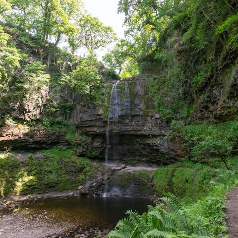 Visit the famous Henrhyd Falls, a four-minute drive or thirteen-minute walk from your doorstep