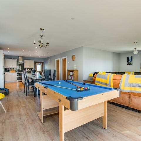 Play a couple of games of pool before heading out to dinner