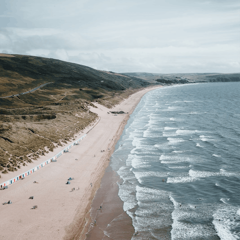 Hop in the car for a ten-minute ride to the striking Woolacombe Beach