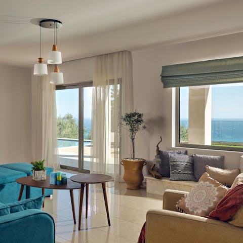 Cool down in your comfy living room with sea views