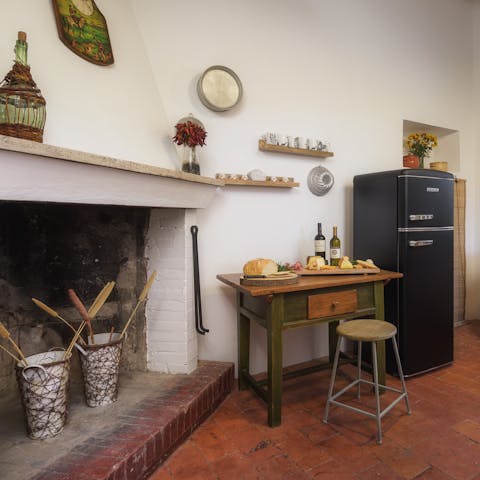 Start each morning in this characterful kitchen, complete with an original fireplace