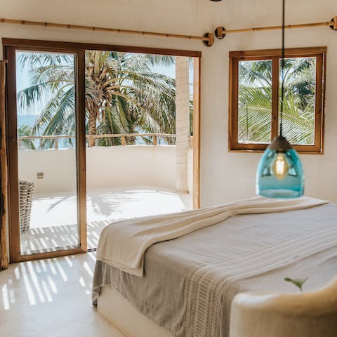 Wake up to views of the Caribbean Sea peeping through the palm trees