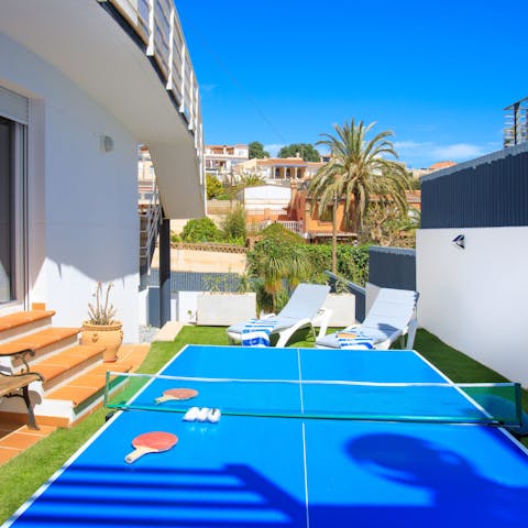 Play a few fiercely competitive games of table tennis on the terrace