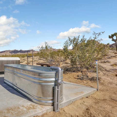 Hop into the cowboy style outside tub