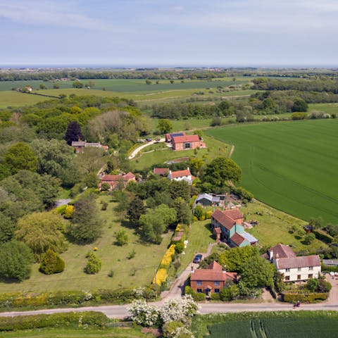 Stay a ten-minute walk from the largest of the Norfolk Broads, in Hickling village