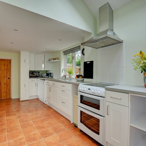 Enjoy cooking homemade meals in your pristine kitchen, while listening to music