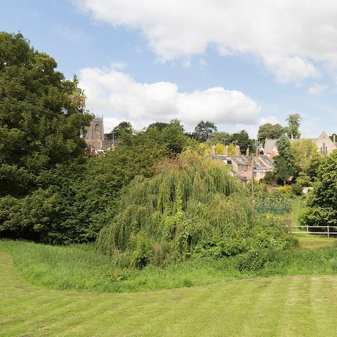 Roam free in the large private garden with immaculate lawns