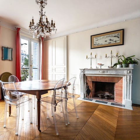 Dine on home-cooked dishes beneath the elegant chandelier in the dining room