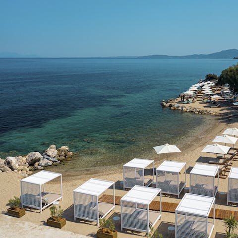 Swim in the Ionian Sea or sunbathe on the resort's golden sands
