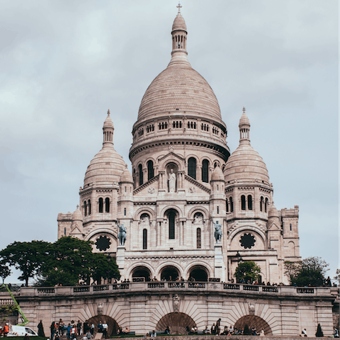 Take in the sweeping views from Sacré-Cœur, fifteen minutes away on foot 