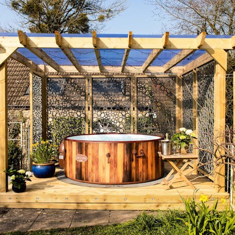 Get the hot tub bubbling for a relaxing soak under the stars