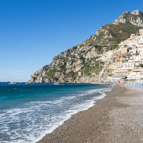 Head to Positano beach for a day cooling off in the sea